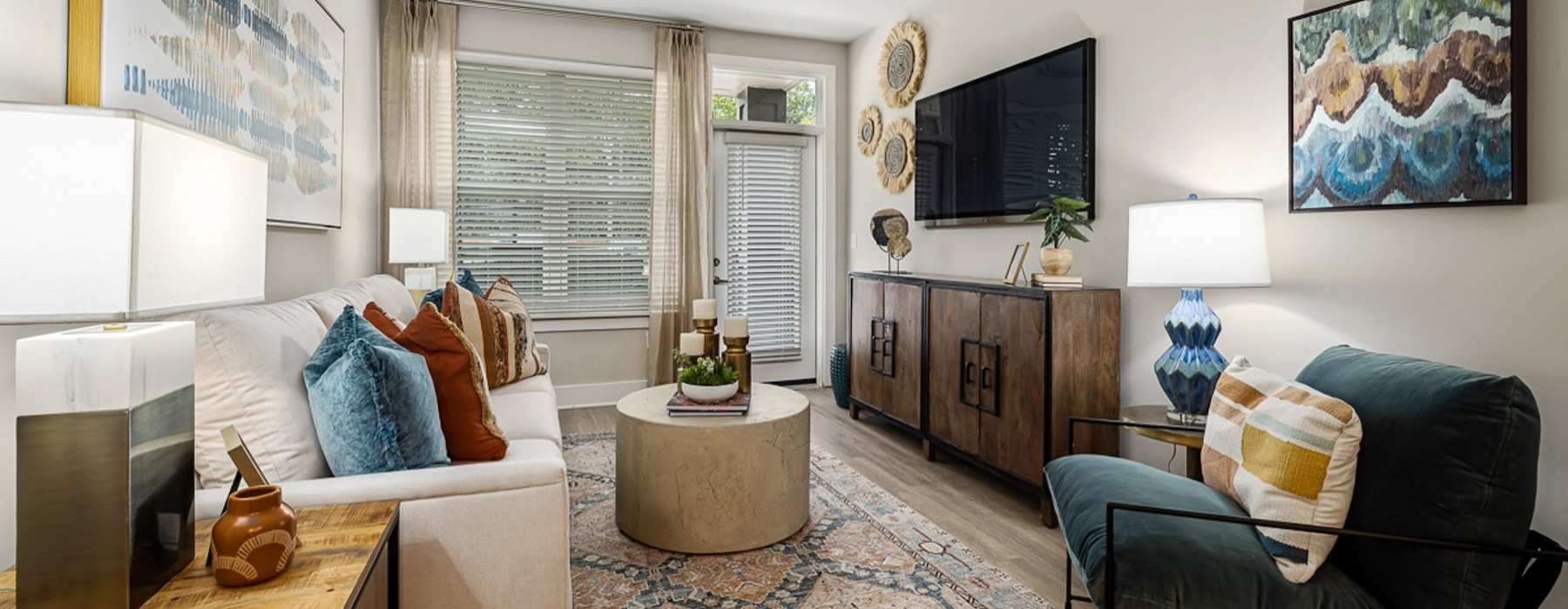 a living room with a couch and a tv